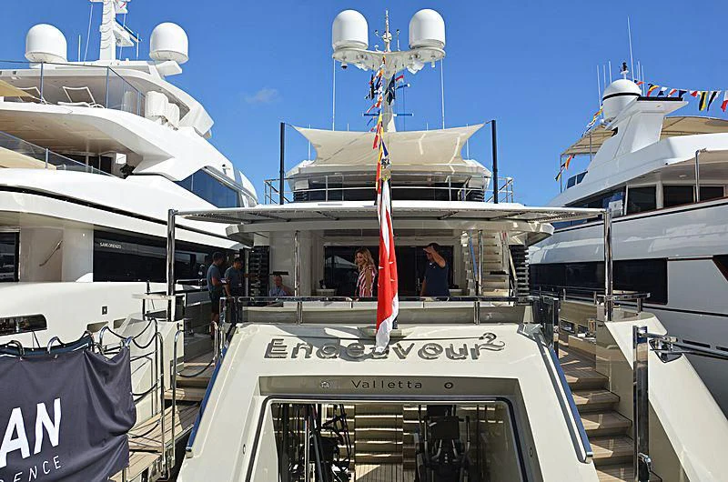 a boat with a flag on the front aboard ENDEAVOUR 2 Yacht for Sale