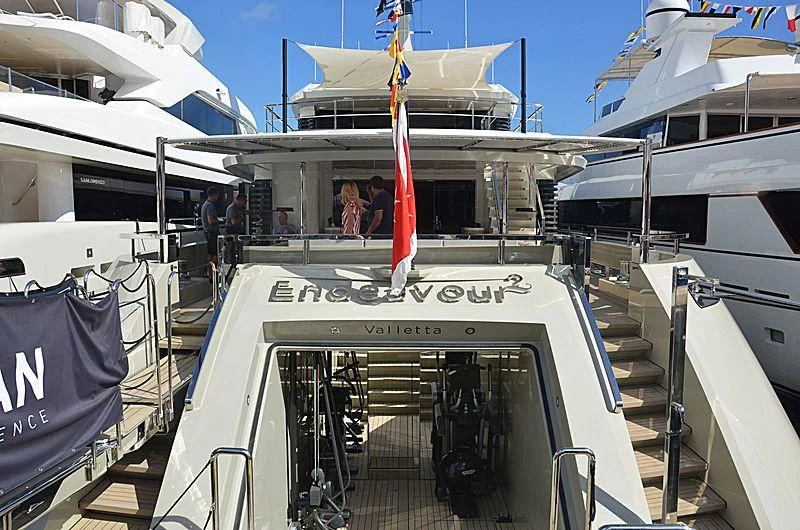 a boat with a flag on the front aboard ENDEAVOUR 2 Yacht for Sale