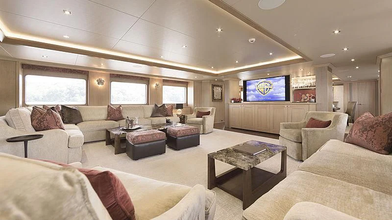 a living room with a large screen aboard ENDEAVOUR 2 Yacht for Sale