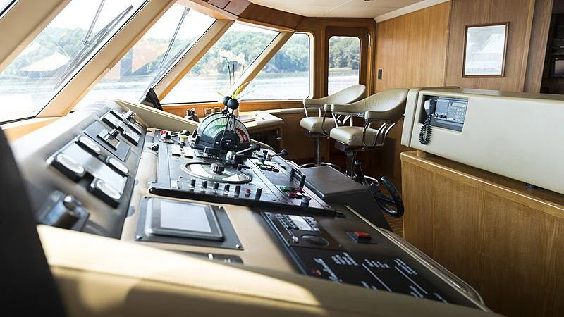 a room with a machine and a desk aboard ENDEAVOUR 2 Yacht for Sale