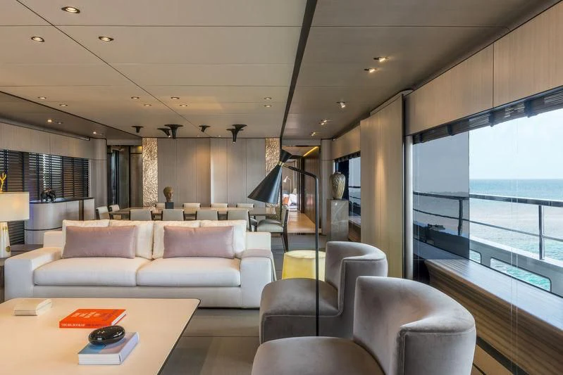 a living room with a large window aboard ENDEAVOUR 2 Yacht for Sale