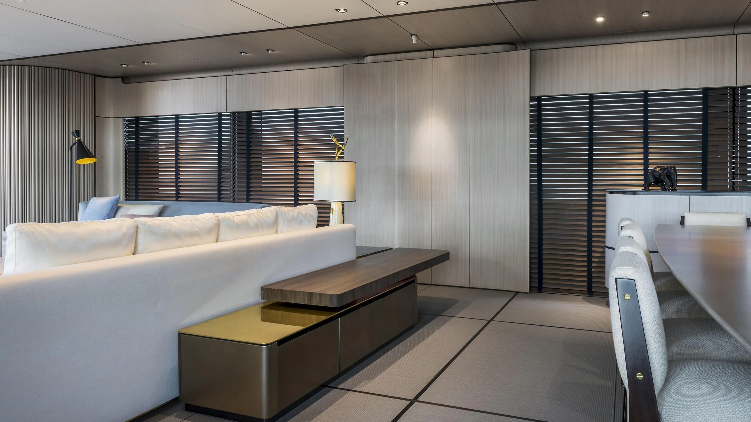 a room with a couch and a table aboard ENDEAVOUR 2 Yacht for Sale