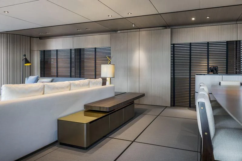 a room with a couch and a table aboard ENDEAVOUR 2 Yacht for Sale