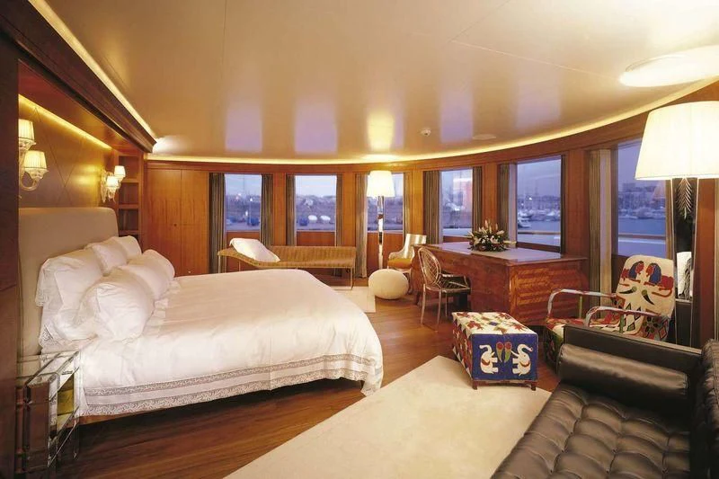 a bedroom with a large bed aboard WEDGE TOO Yacht for Sale