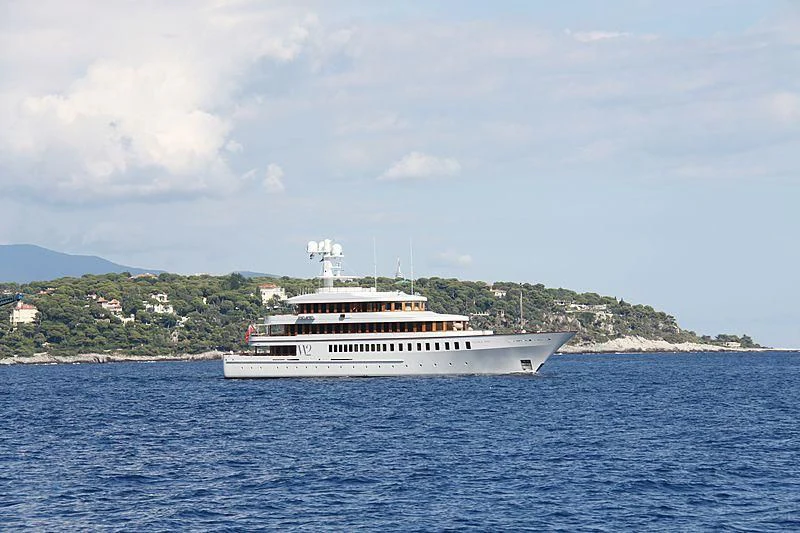 a large ship in the water aboard WEDGE TOO Yacht for Sale