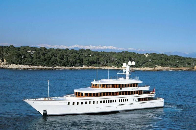 a white boat in the water aboard WEDGE TOO Yacht for Sale