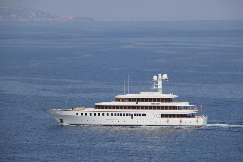 a large white ship in the water aboard WEDGE TOO Yacht for Sale