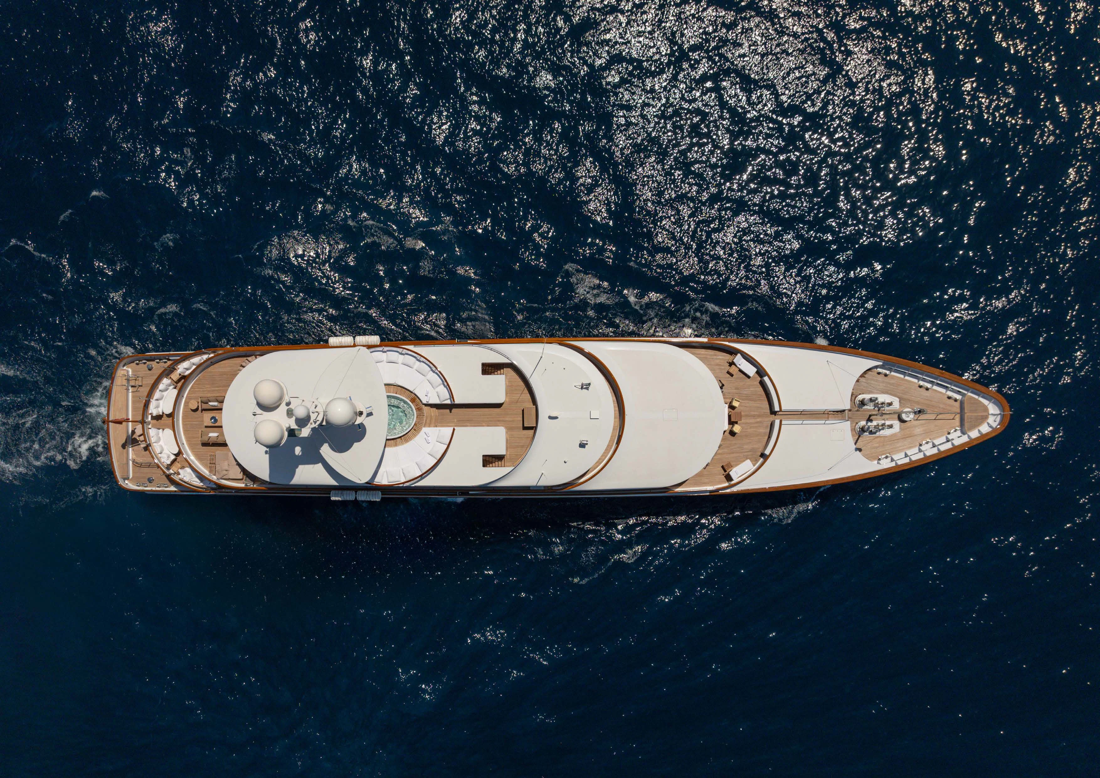 a gold belt with a logo on it aboard WEDGE TOO Yacht for Sale