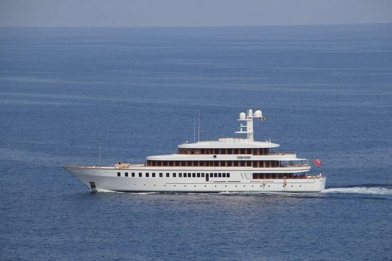 a large white ship in the water aboard WEDGE TOO Yacht for Sale