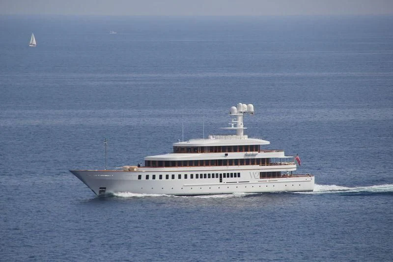 a large white ship in the water aboard WEDGE TOO Yacht for Sale