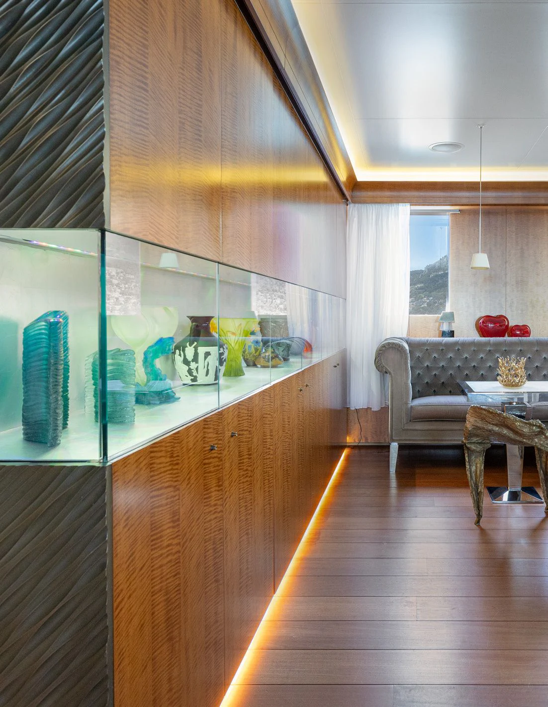 a kitchen with a glass wall aboard WEDGE TOO Yacht for Sale