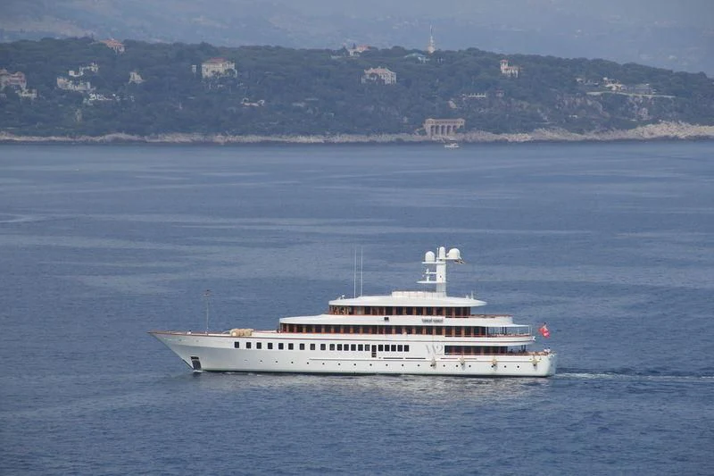 a white boat in the water aboard WEDGE TOO Yacht for Sale