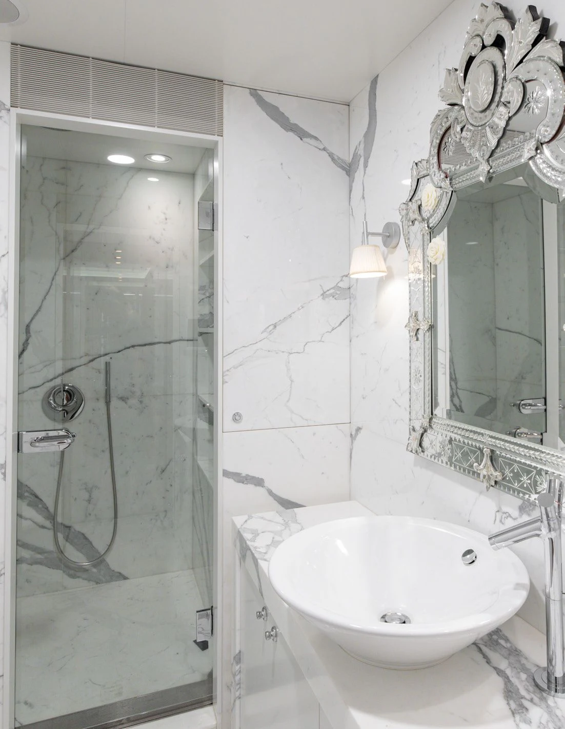 a bathroom with a glass shower aboard WEDGE TOO Yacht for Sale