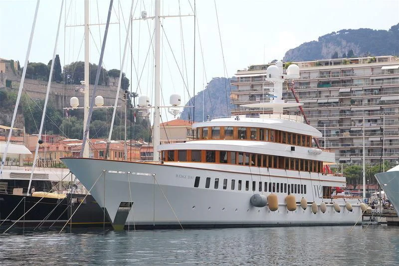 a large white boat in the water aboard WEDGE TOO Yacht for Sale