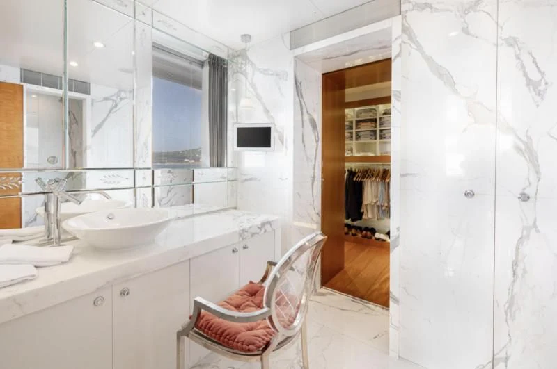 a bathroom with a sink and a mirror aboard WEDGE TOO Yacht for Sale
