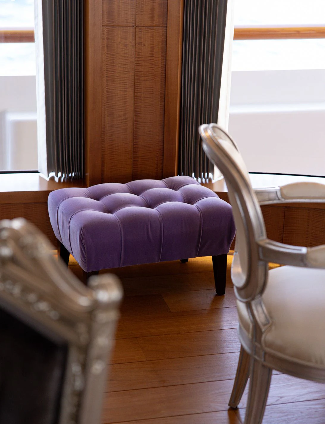 a purple chair in a room aboard WEDGE TOO Yacht for Sale