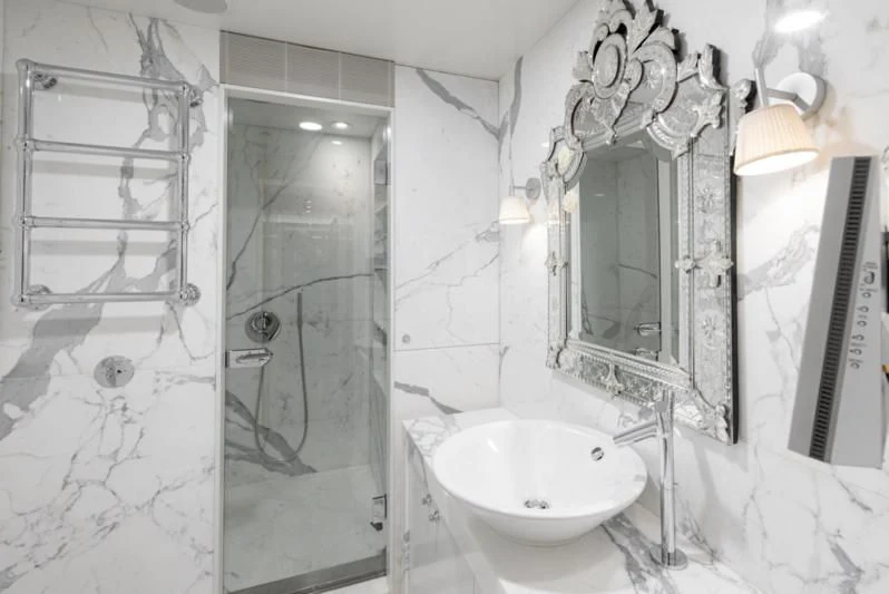 a bathroom with a sink and shower aboard WEDGE TOO Yacht for Sale
