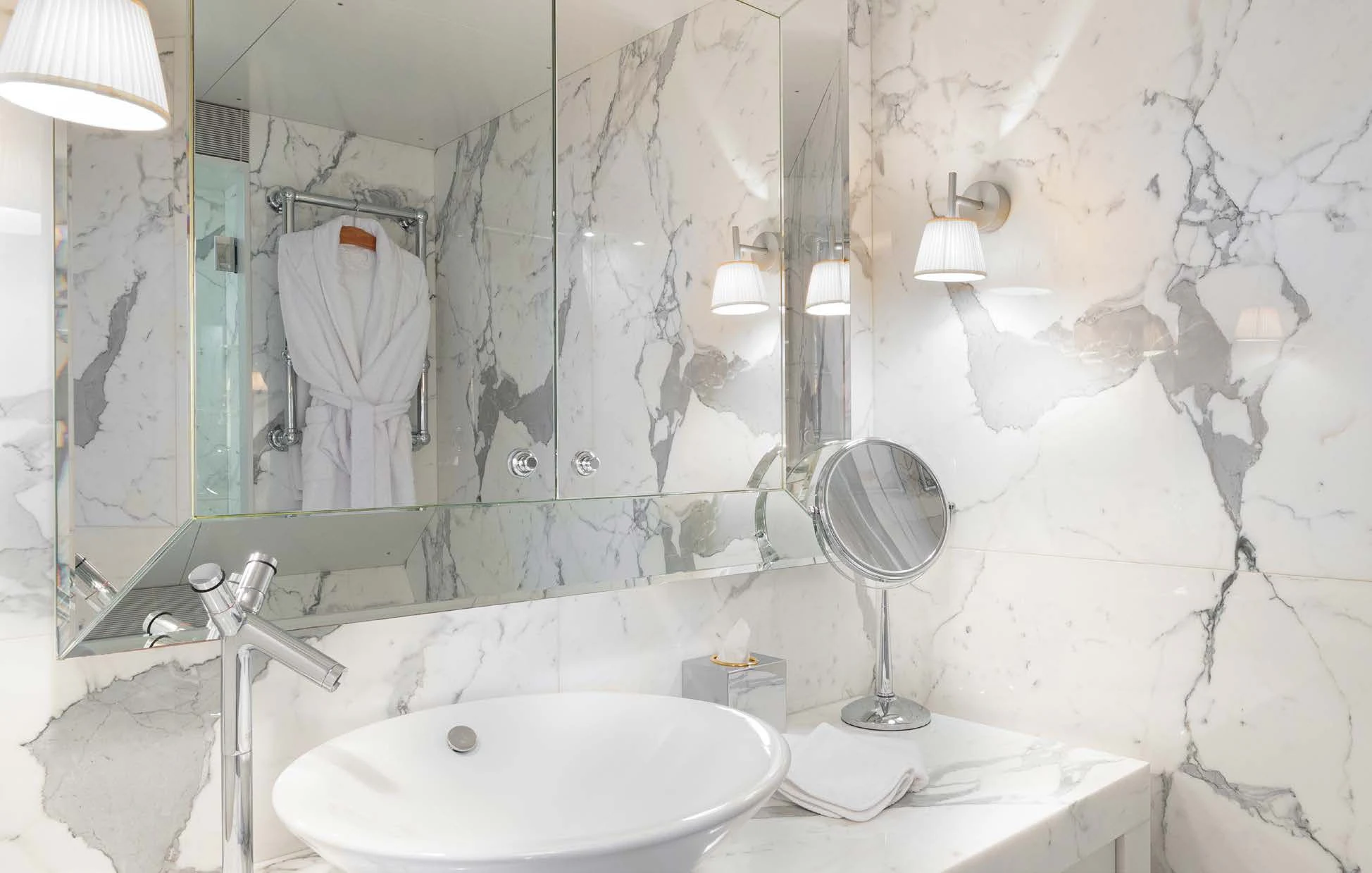 a bathroom with a large mirror aboard WEDGE TOO Yacht for Sale