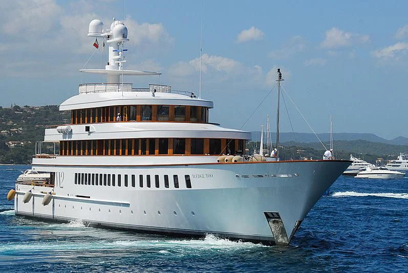 a large white boat aboard WEDGE TOO Yacht for Sale