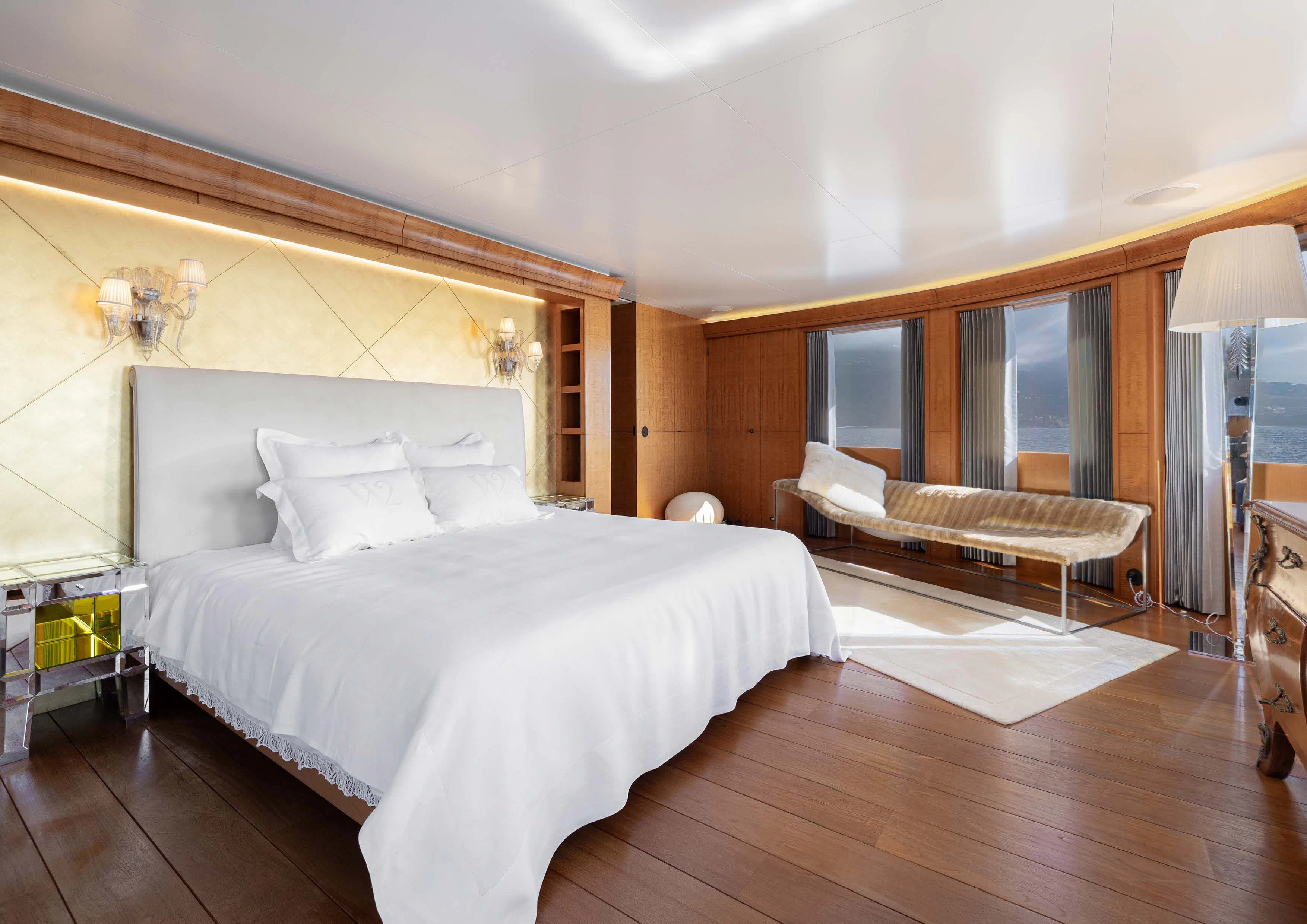 a large bedroom with a large bed aboard WEDGE TOO Yacht for Sale