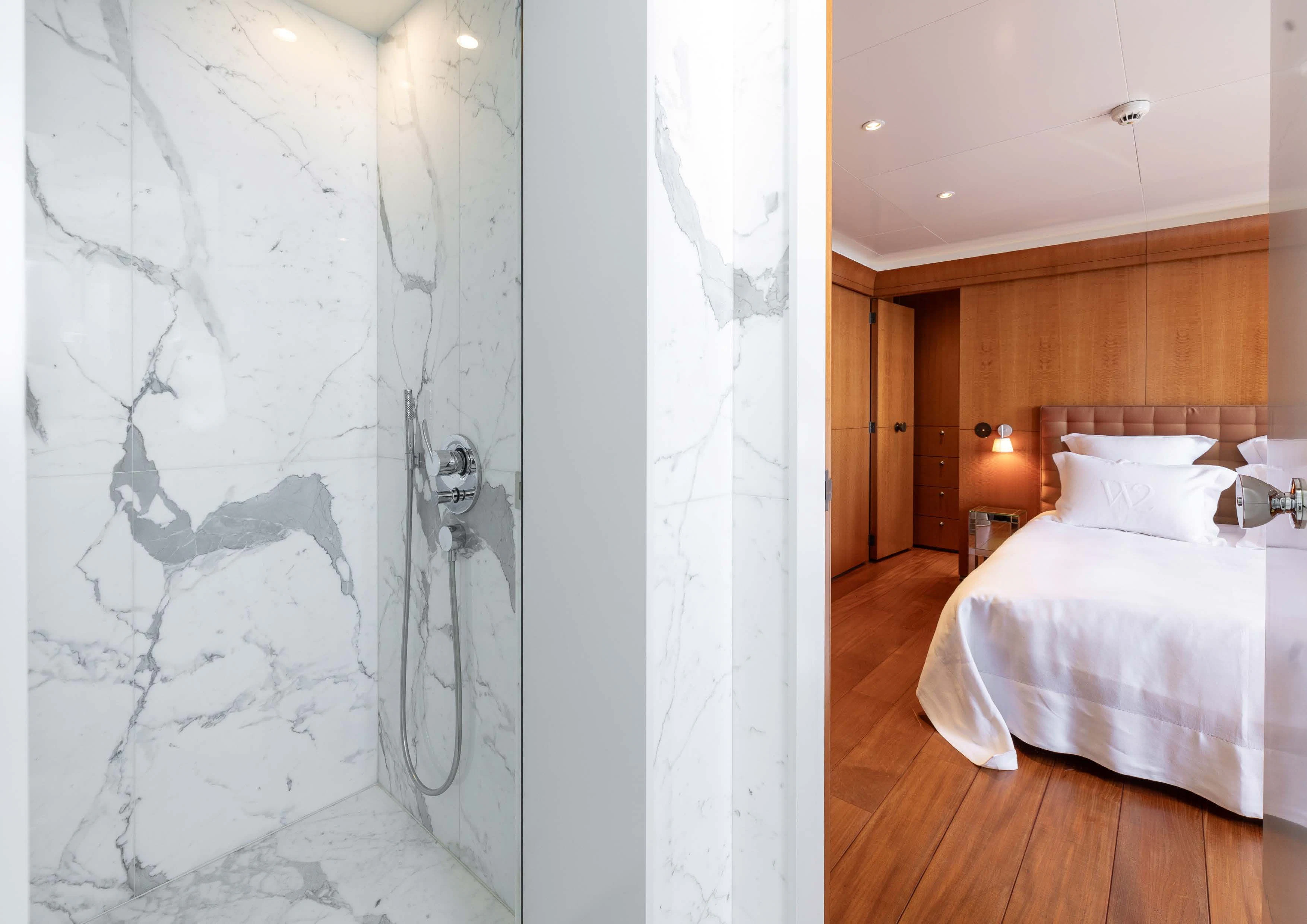 a room with a bed and a wall of ice aboard WEDGE TOO Yacht for Sale
