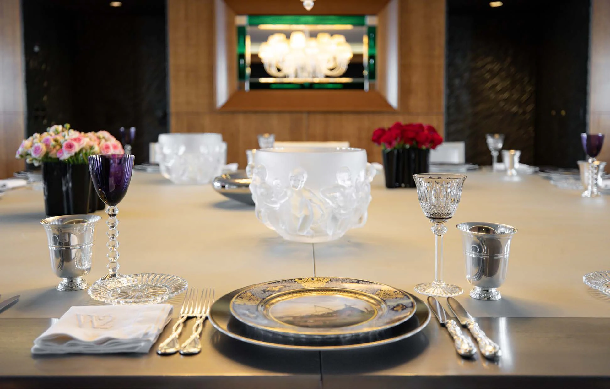 a table with plates and glasses aboard WEDGE TOO Yacht for Sale