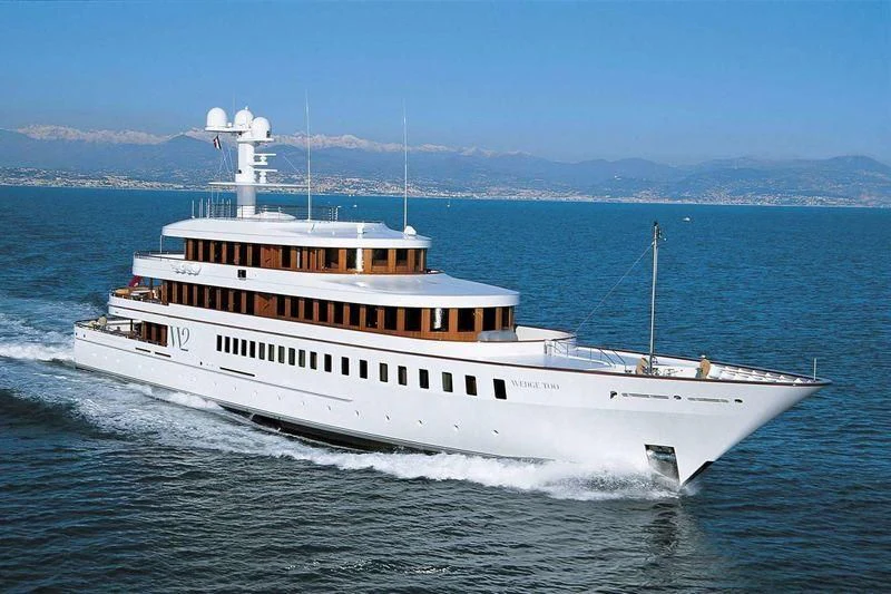 a large white ship in the water aboard WEDGE TOO Yacht for Sale
