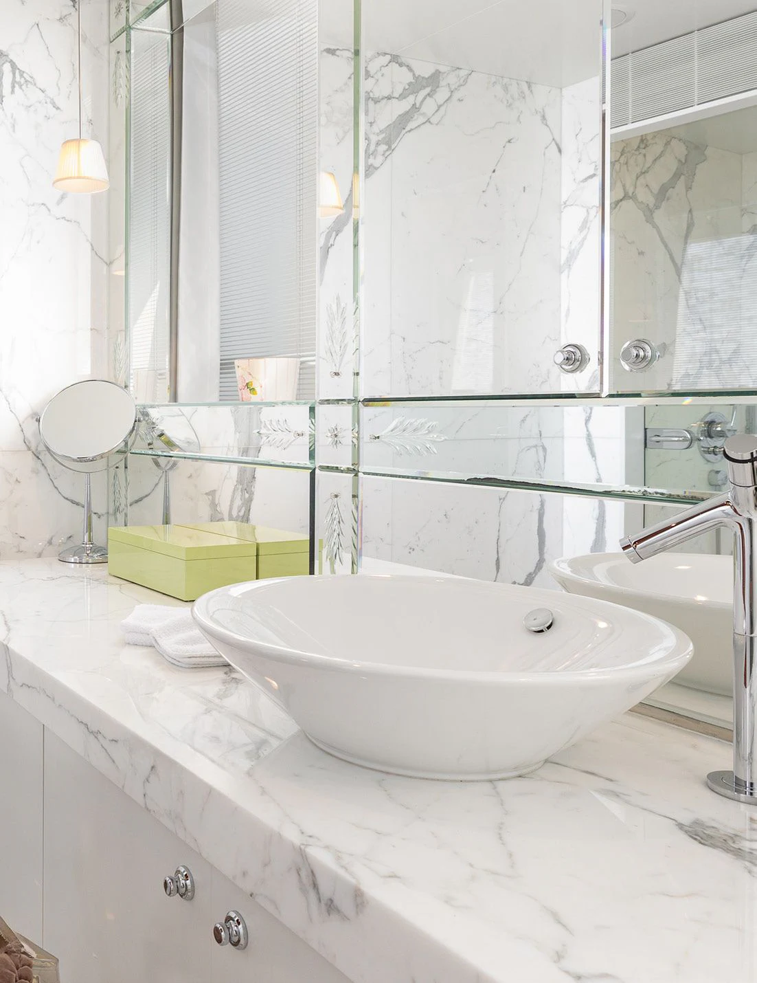 a bathroom with a sink and a mirror aboard WEDGE TOO Yacht for Sale