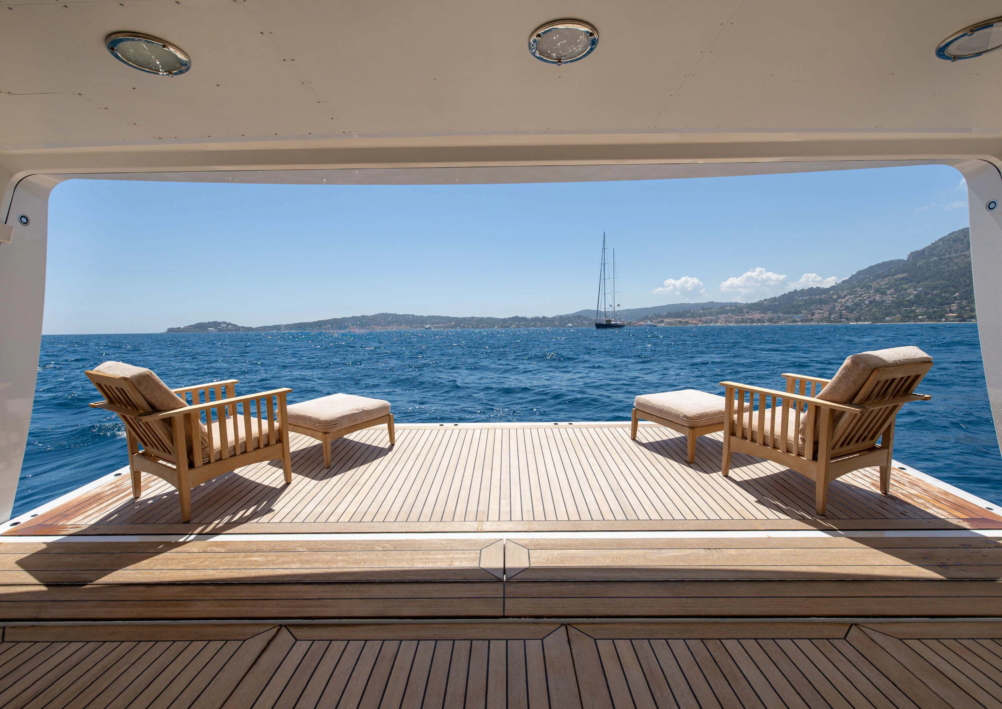 a deck overlooking the ocean aboard WEDGE TOO Yacht for Sale