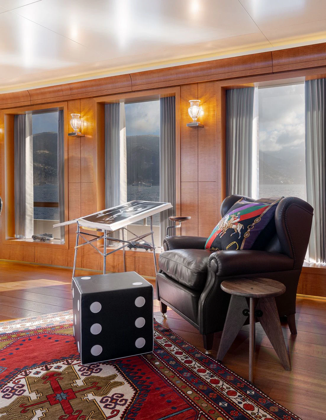 a living room with a table and chairs aboard WEDGE TOO Yacht for Sale