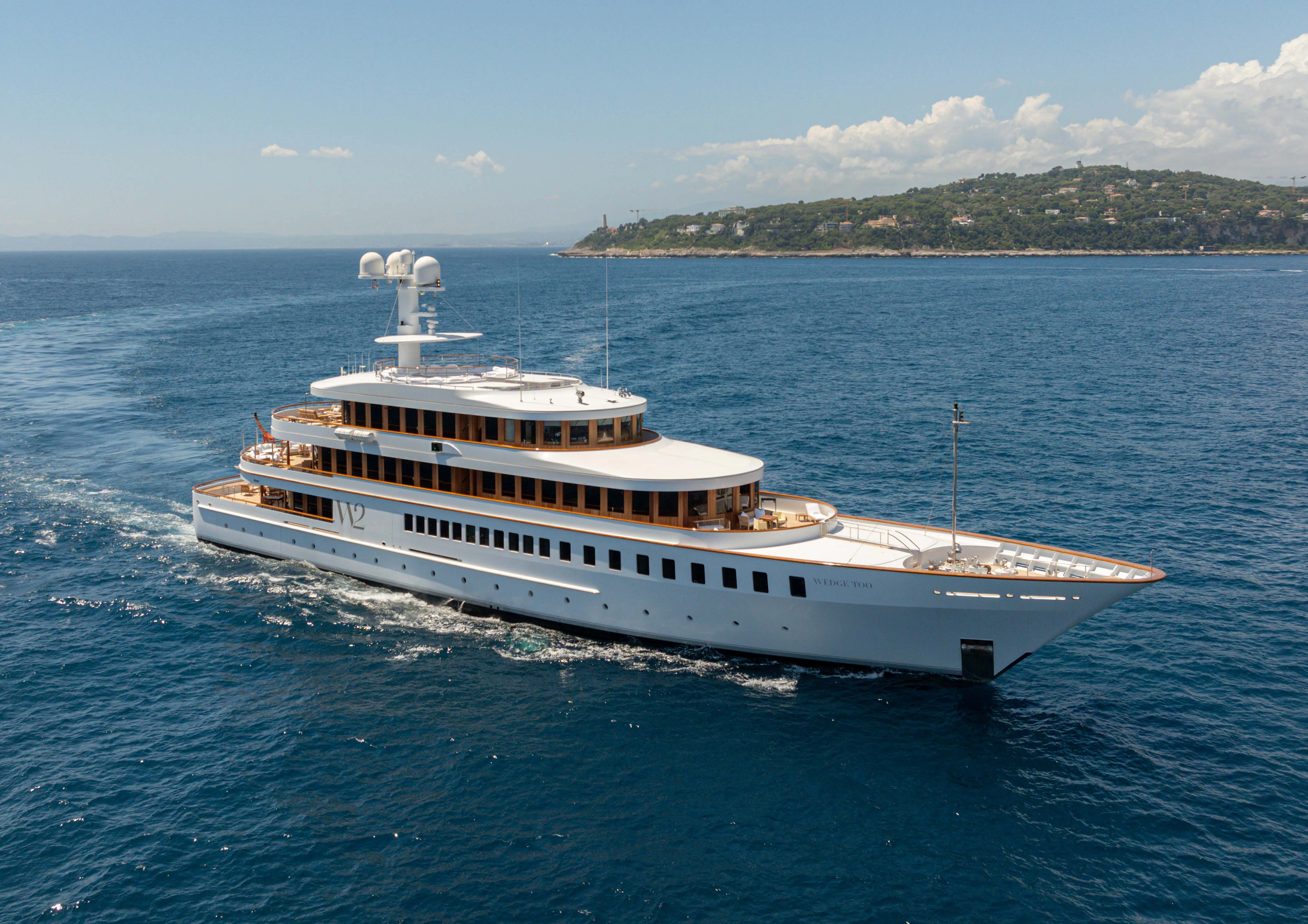 a large white boat in the water aboard WEDGE TOO Yacht for Sale