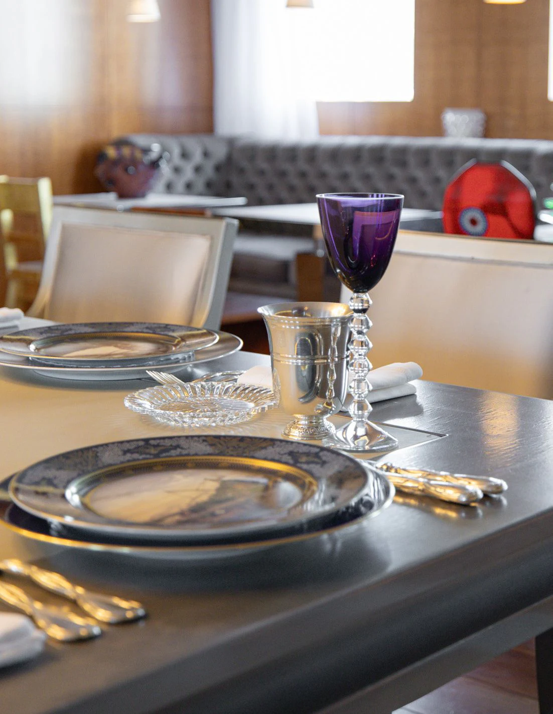 a glass of wine on a table aboard WEDGE TOO Yacht for Sale