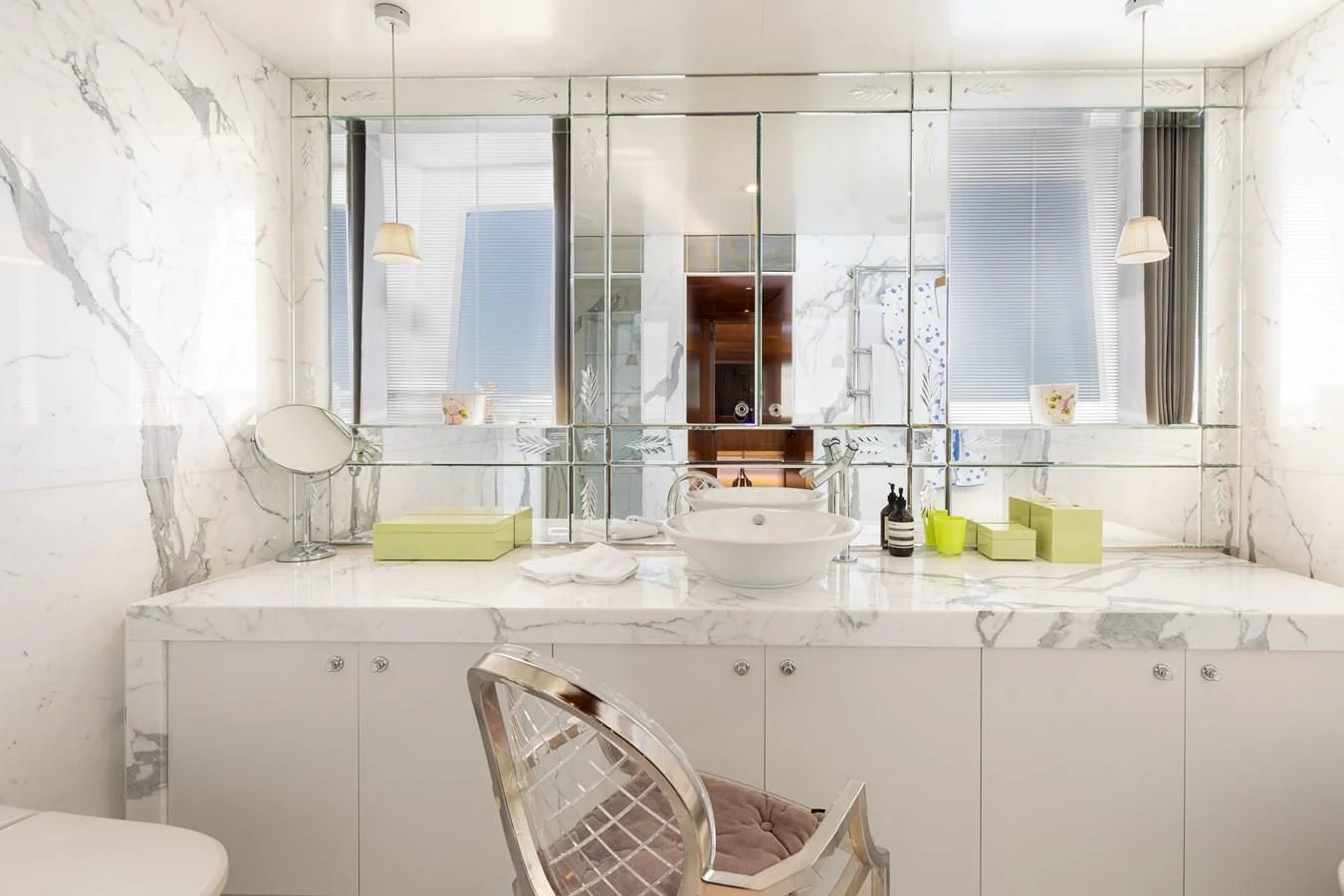 a bathroom with a sink and mirror aboard WEDGE TOO Yacht for Sale