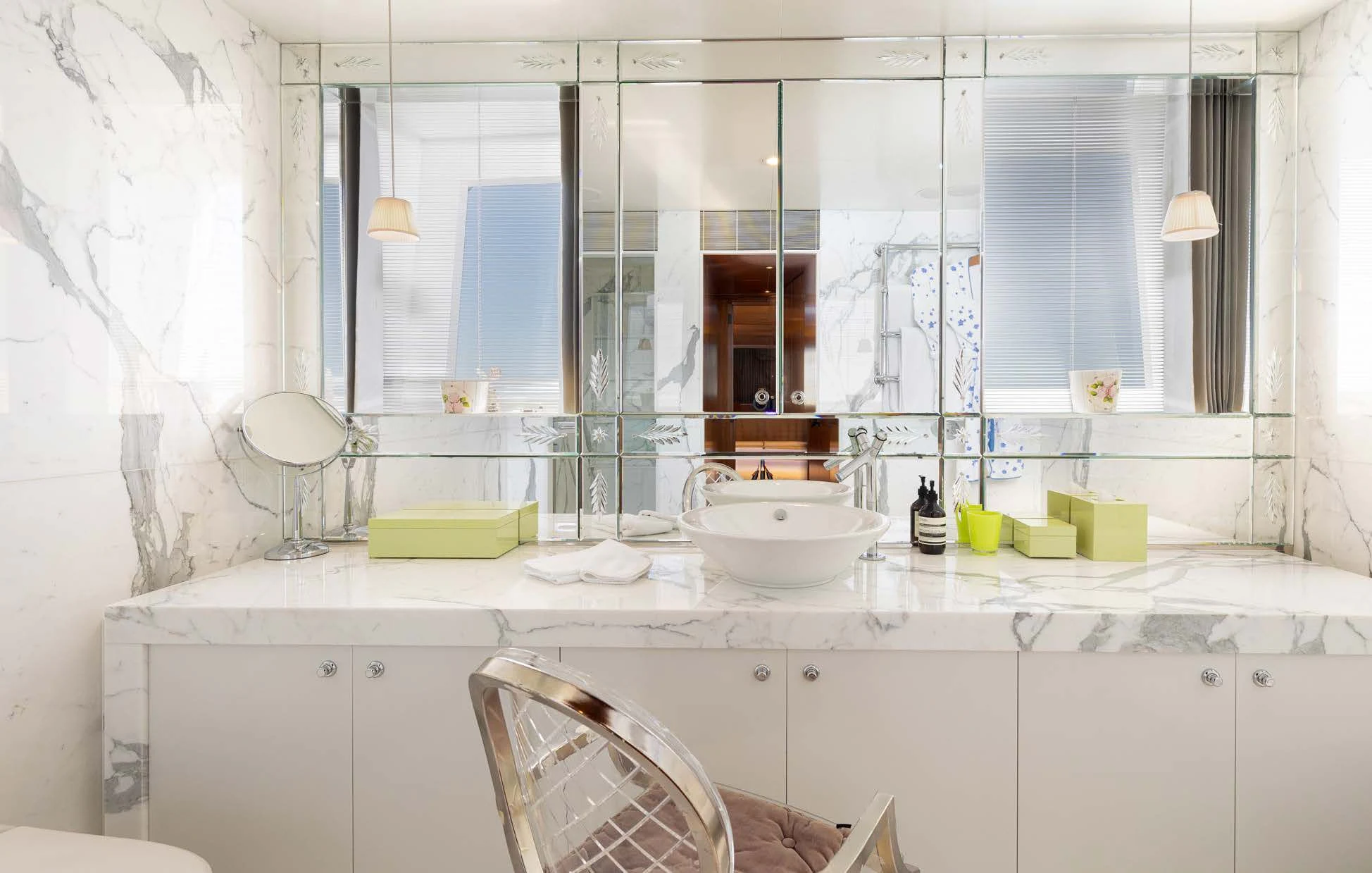 a bathroom with a sink and mirror aboard WEDGE TOO Yacht for Sale