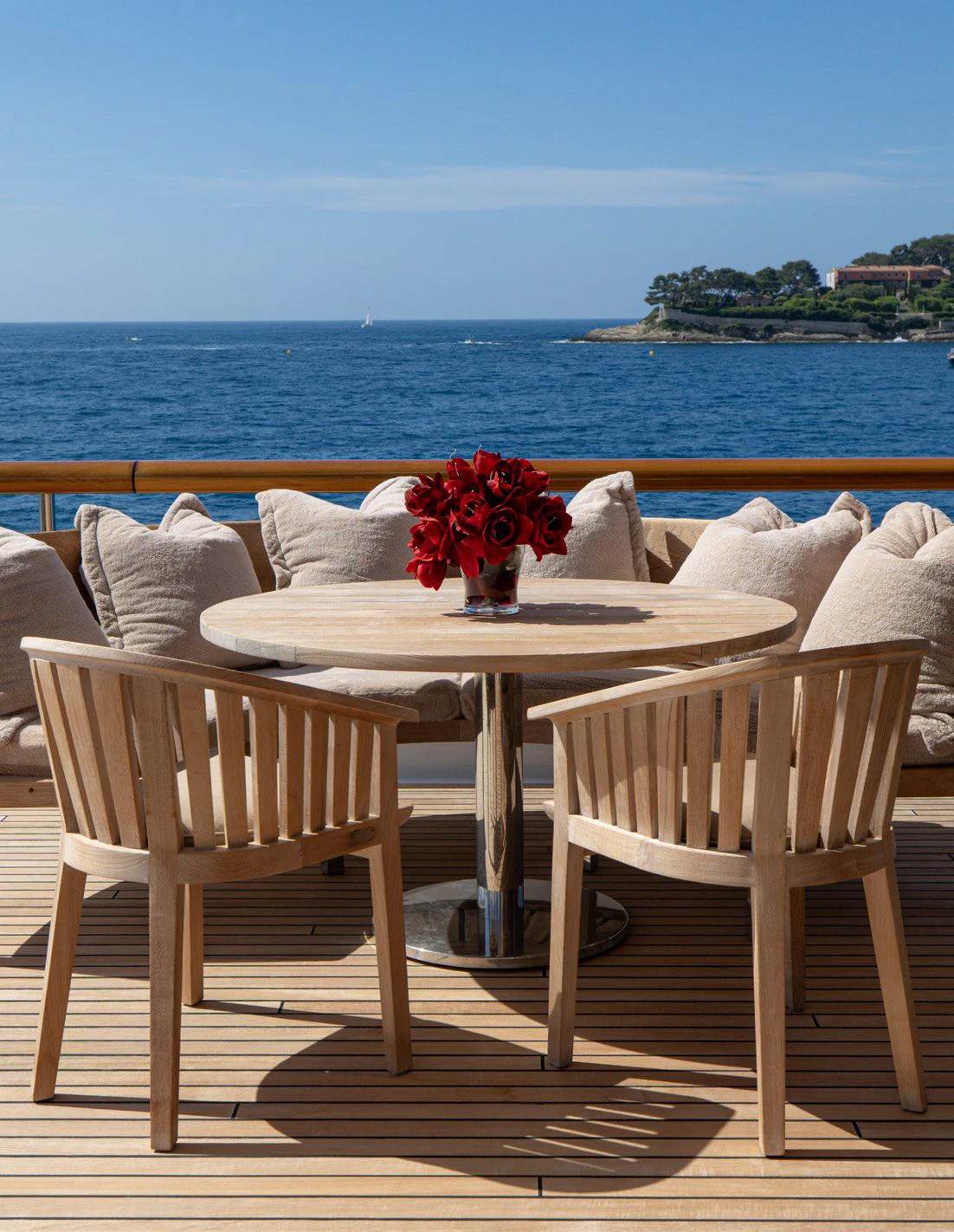 a table with chairs on it aboard WEDGE TOO Yacht for Sale