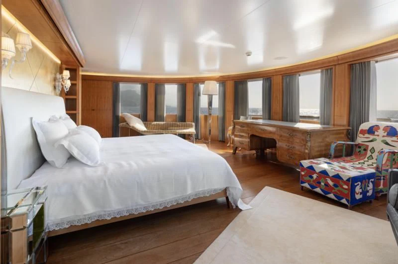 a bedroom with a large bed aboard WEDGE TOO Yacht for Sale