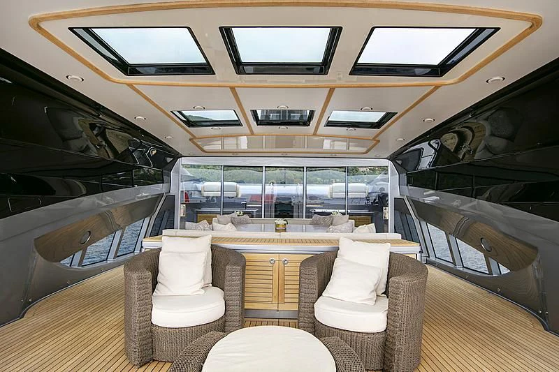 inside of a car aboard FIVE Yacht for Sale