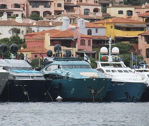 boats docked in a harbor aboard FIVE Yacht for Sale