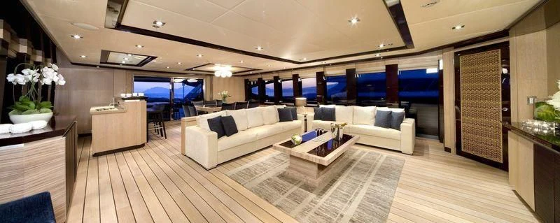 a living room with a large window aboard FIVE Yacht for Sale