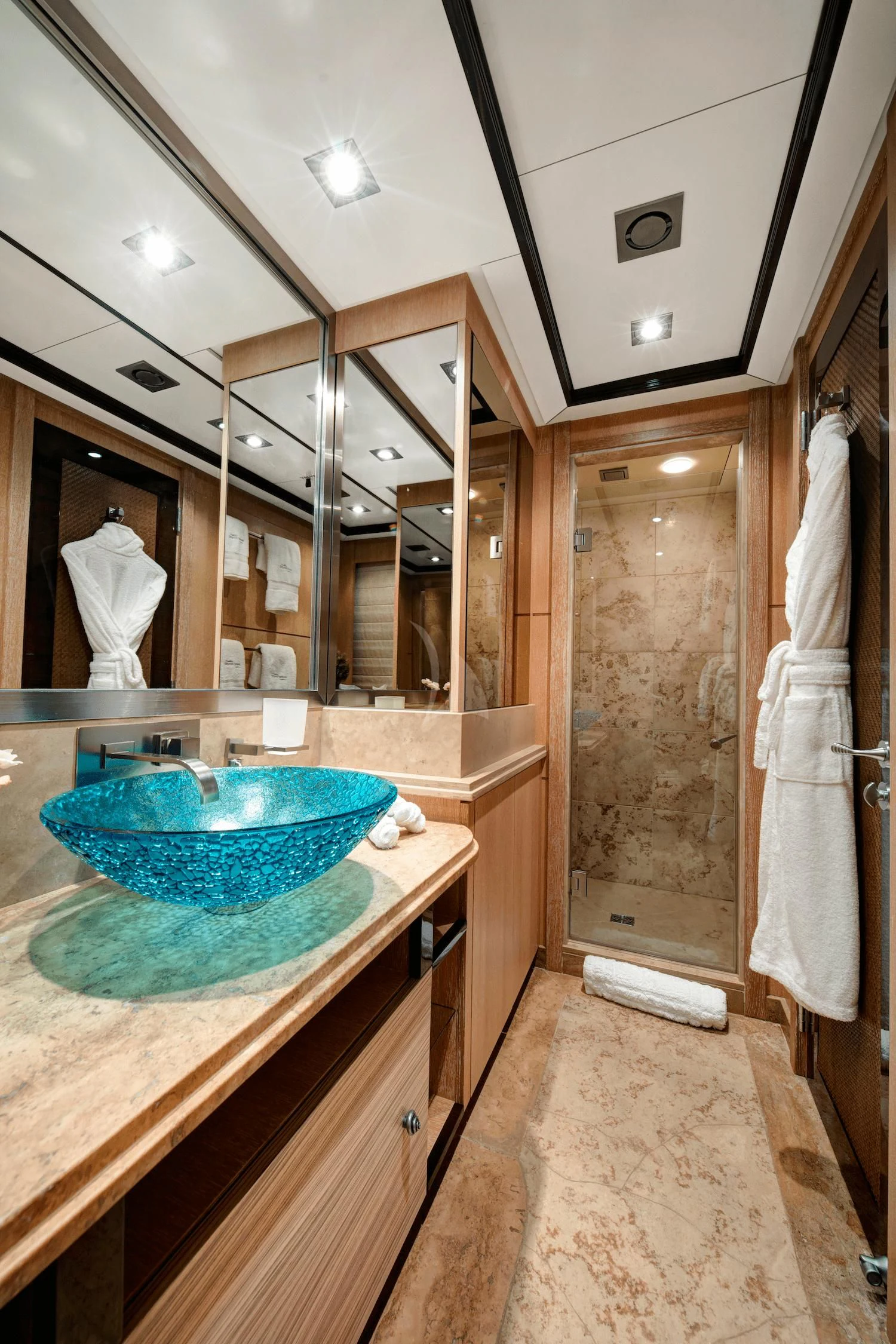 a bathroom with a sink and a mirror aboard FIVE Yacht for Sale