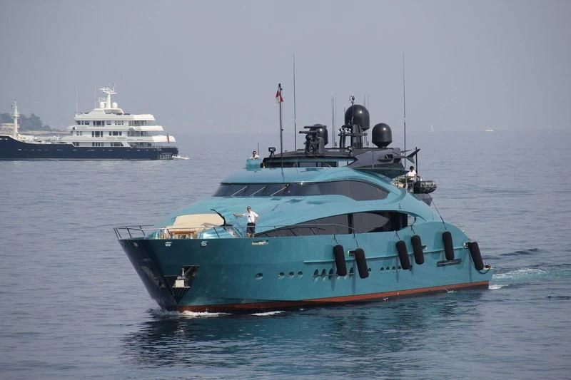 a couple of boats in the water aboard FIVE Yacht for Sale