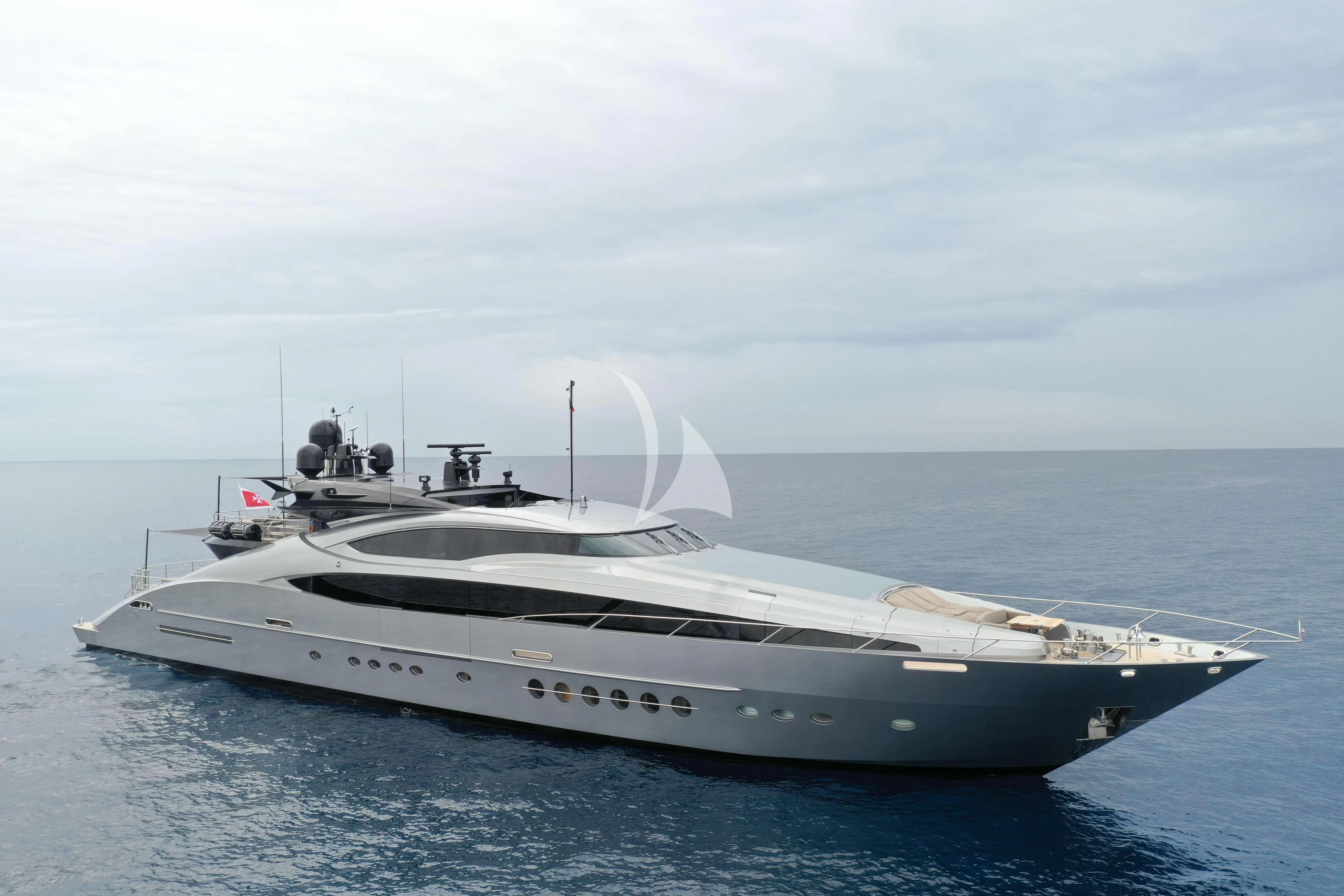 a white yacht in the ocean aboard FIVE Yacht for Sale