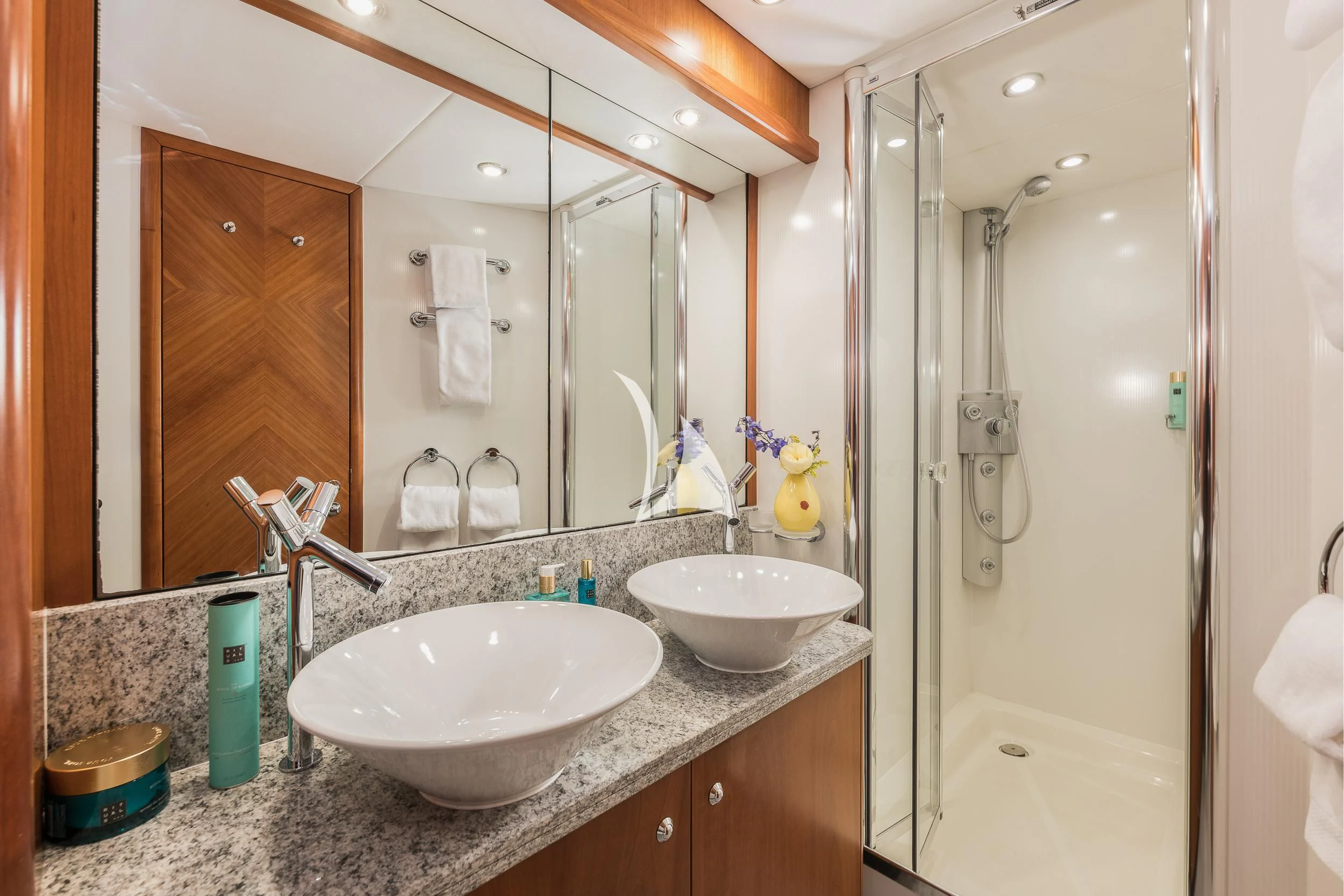 a bathroom with a sink and a shower aboard FROGGY Yacht for Sale