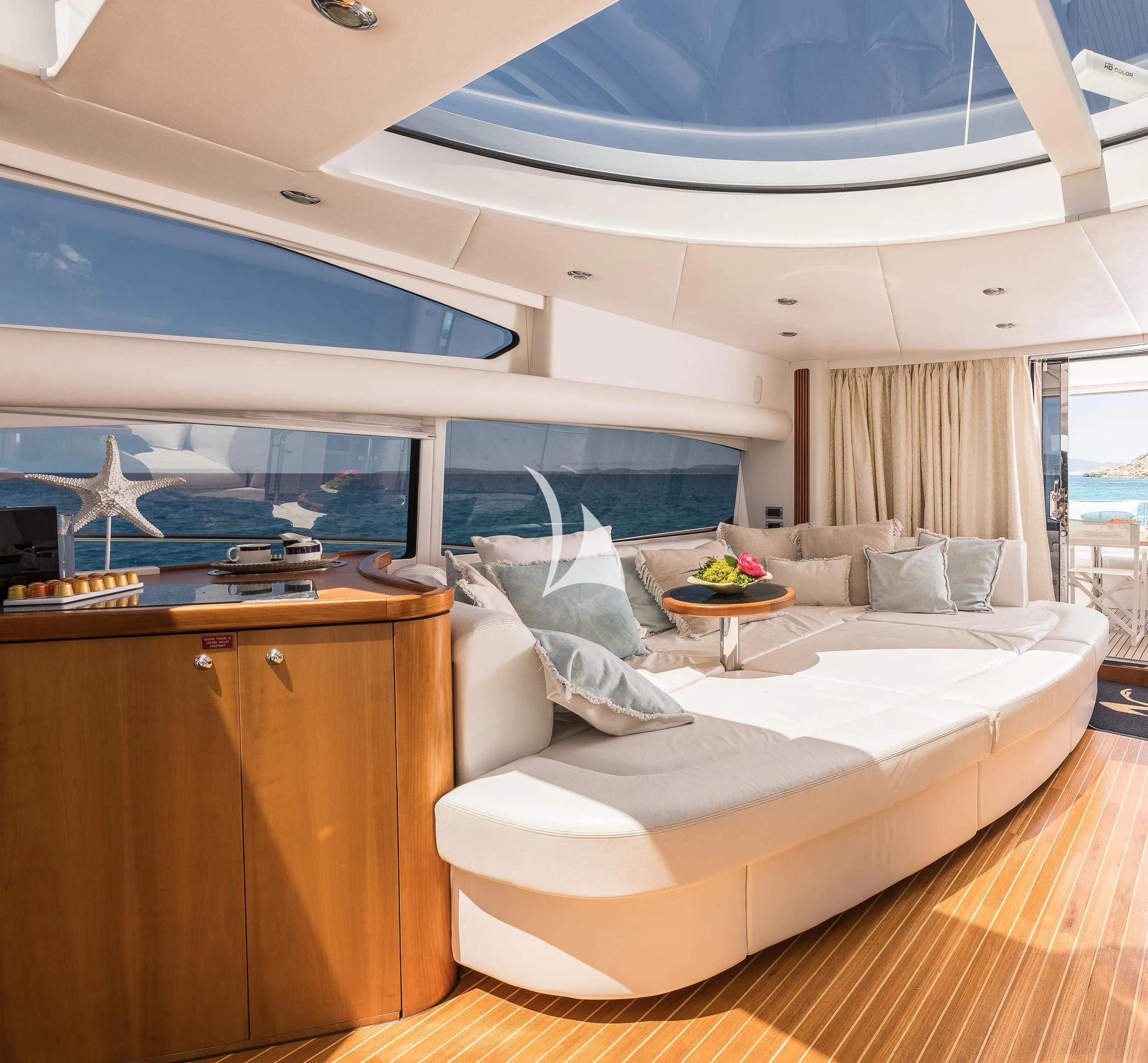 a bedroom with a bed and a desk aboard FROGGY Yacht for Sale