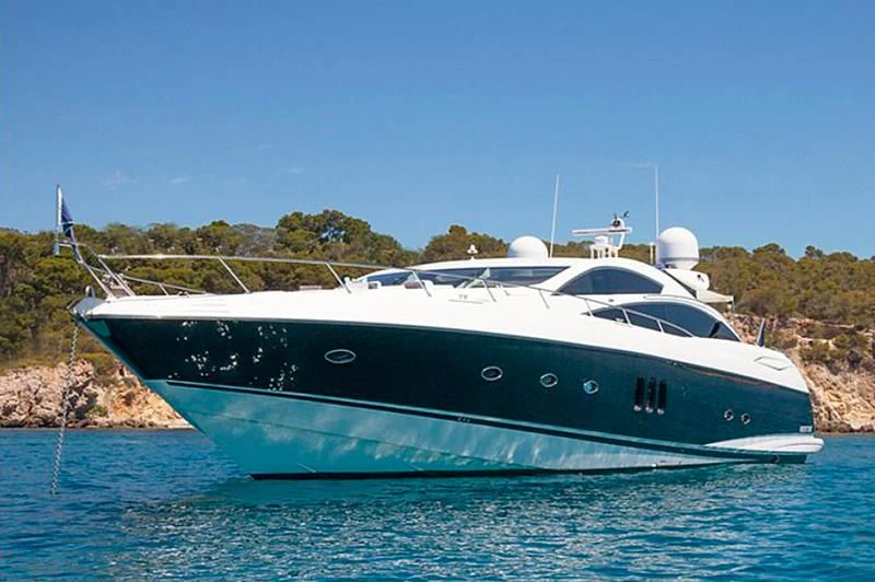 a white yacht in the water aboard FROGGY Yacht for Sale