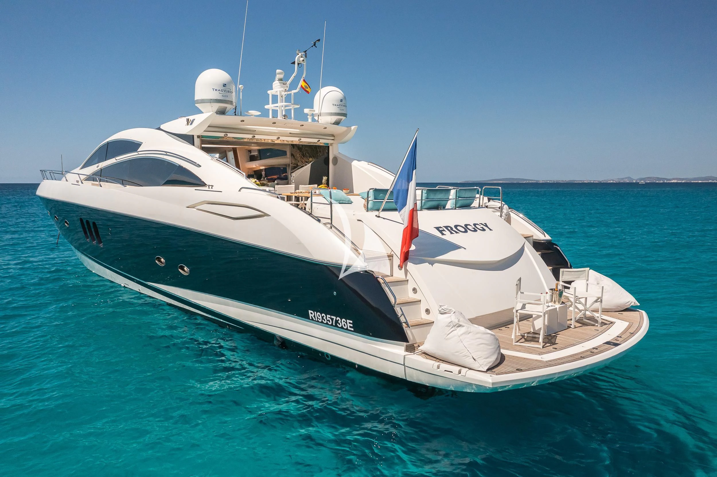 a white yacht in the water aboard FROGGY Yacht for Sale