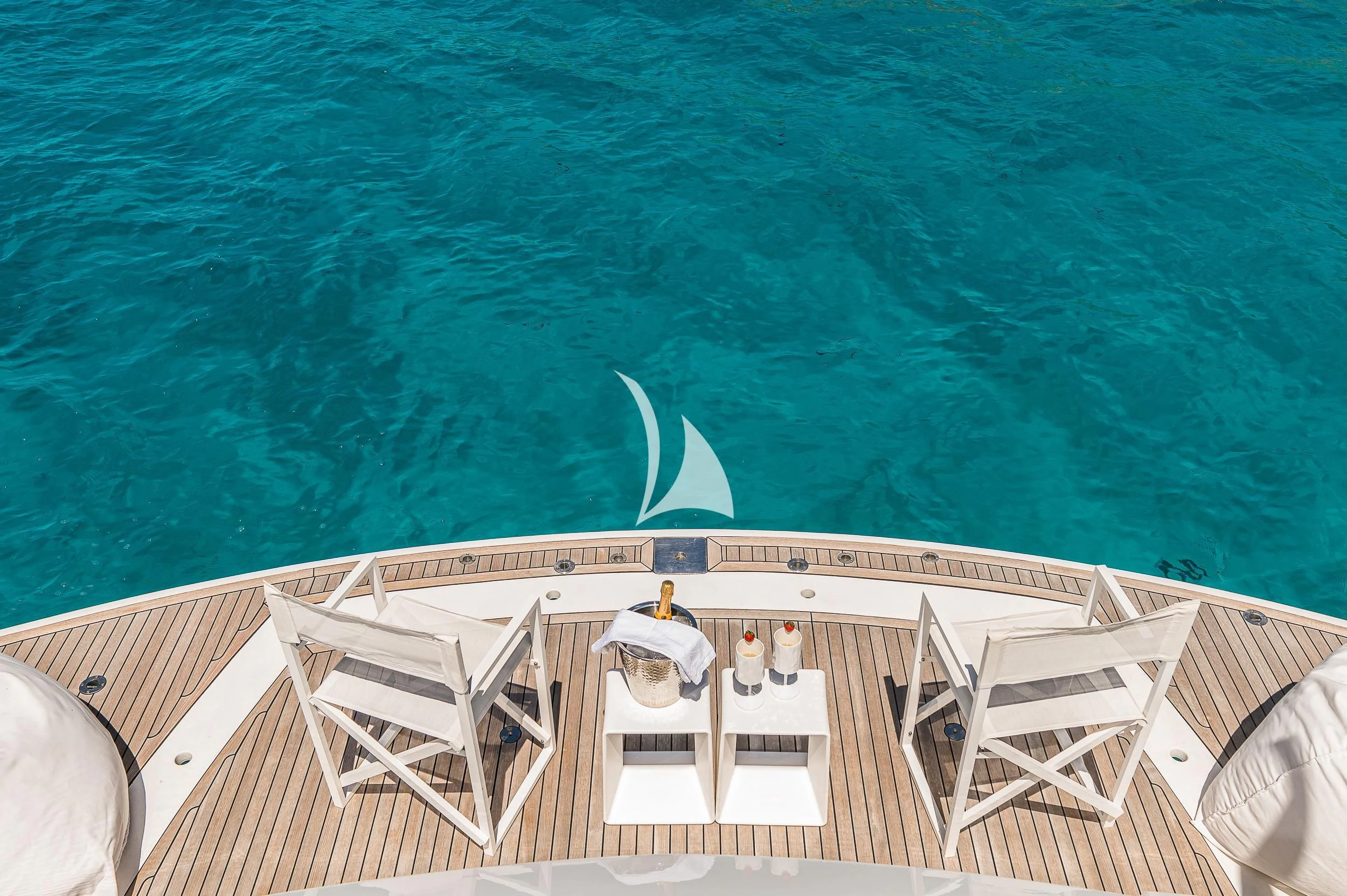 a building with a body of water in the background aboard FROGGY Yacht for Sale