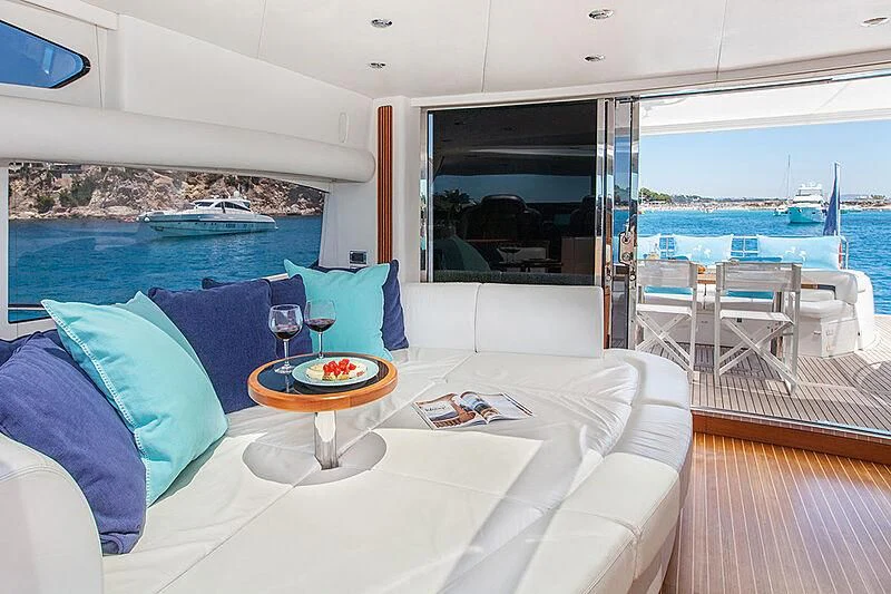 a large living room with a view of the ocean aboard FROGGY Yacht for Sale
