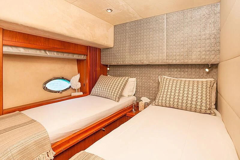 a room with two beds aboard FROGGY Yacht for Sale