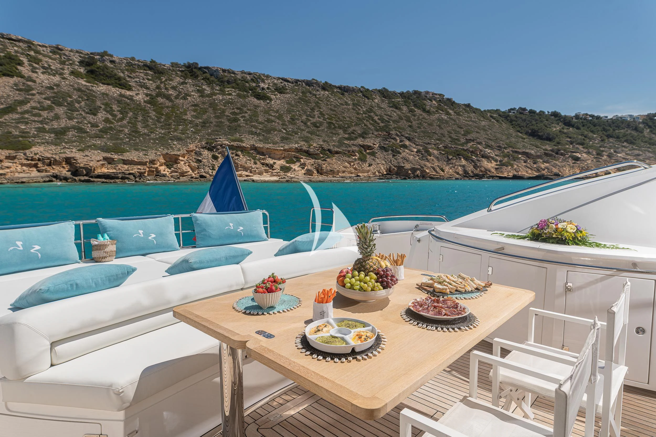 a table with food on it aboard FROGGY Yacht for Sale